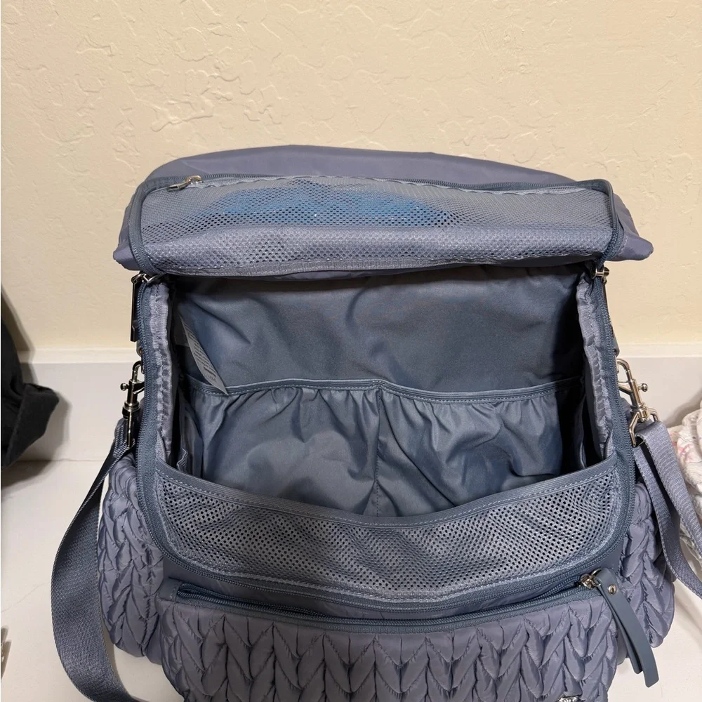 Happ brand diaper bag in a beautiful blue